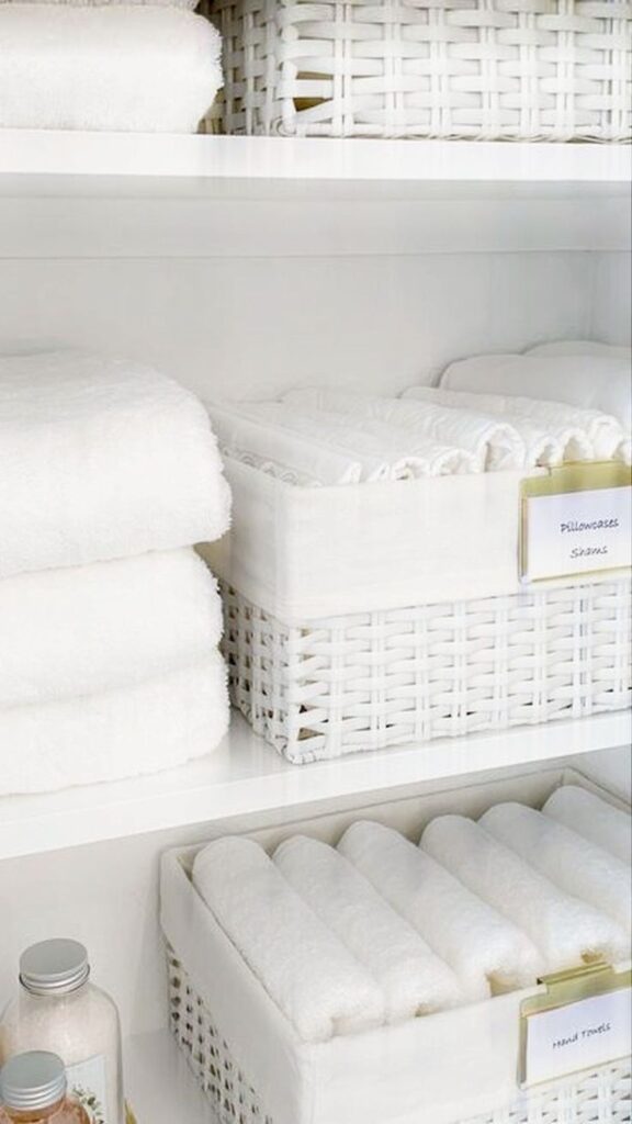organize towels in bathroom closet