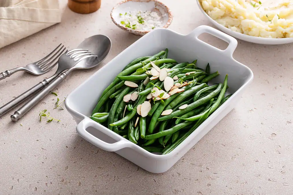 14 Healthy and Easy Thanksgiving Recipes to Wow Your Guests 7 Sauteed Green Beans with Almonds